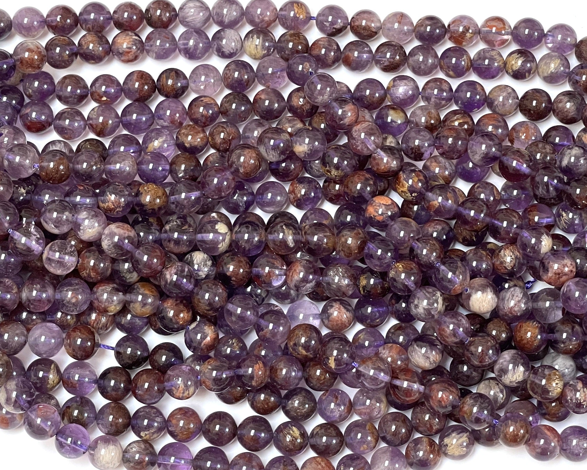 Super Seven Cacoxenite Amethyst 10mm round beads 16" strand
