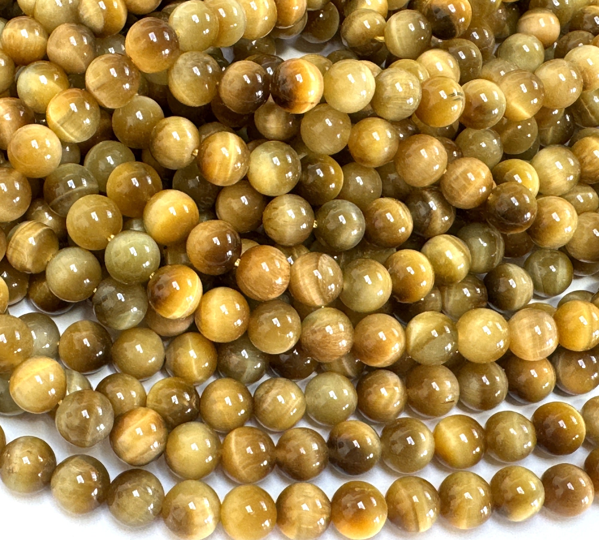 Golden Tiger Eye 8mm round gemstone beads 38cm strand
