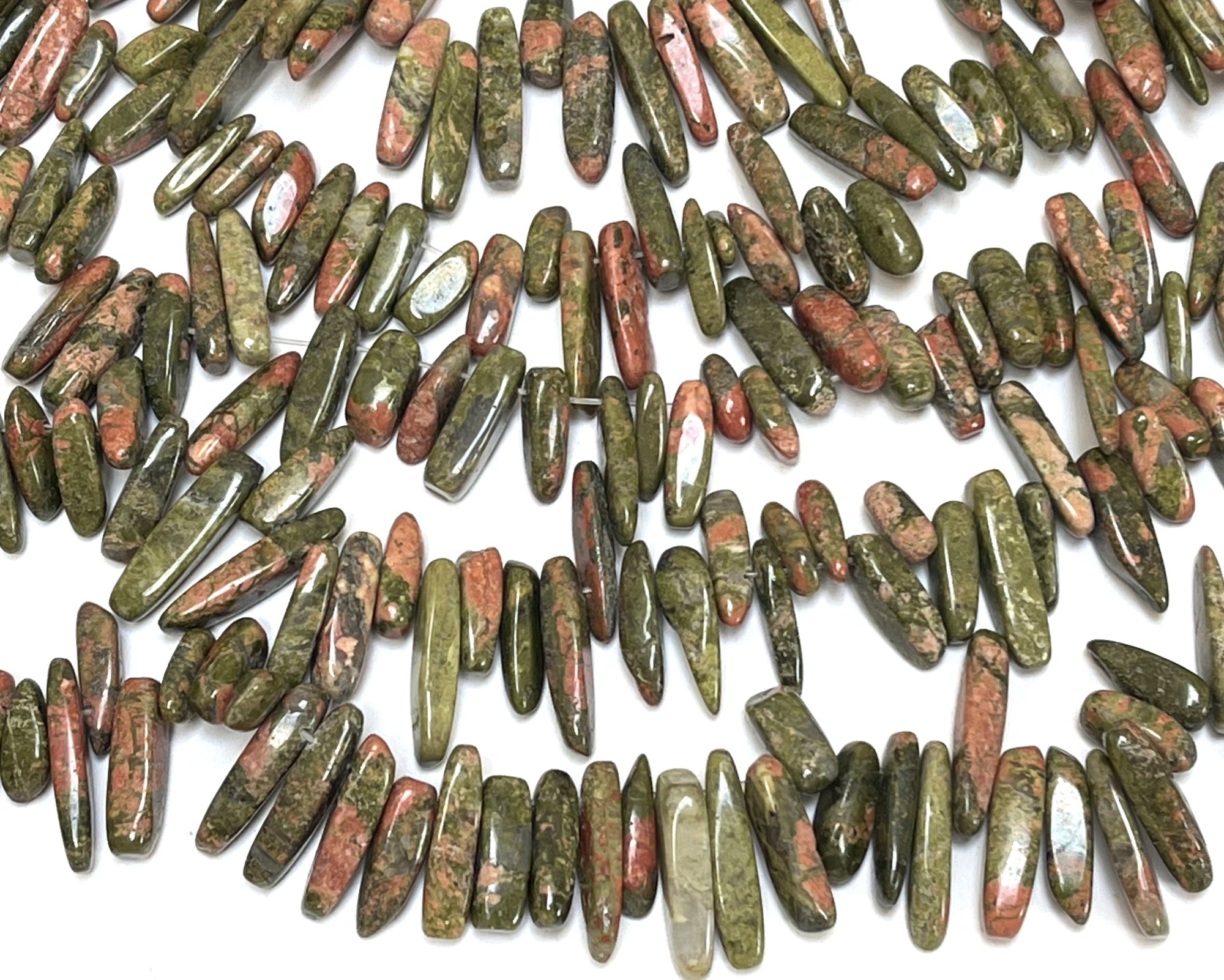 Unakite top drilled tooth stick dagger beads 15" strand