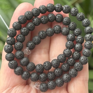 Lava Black porous diffuser beads, 6-10mm, on a 15.5-inch lava bead strand.