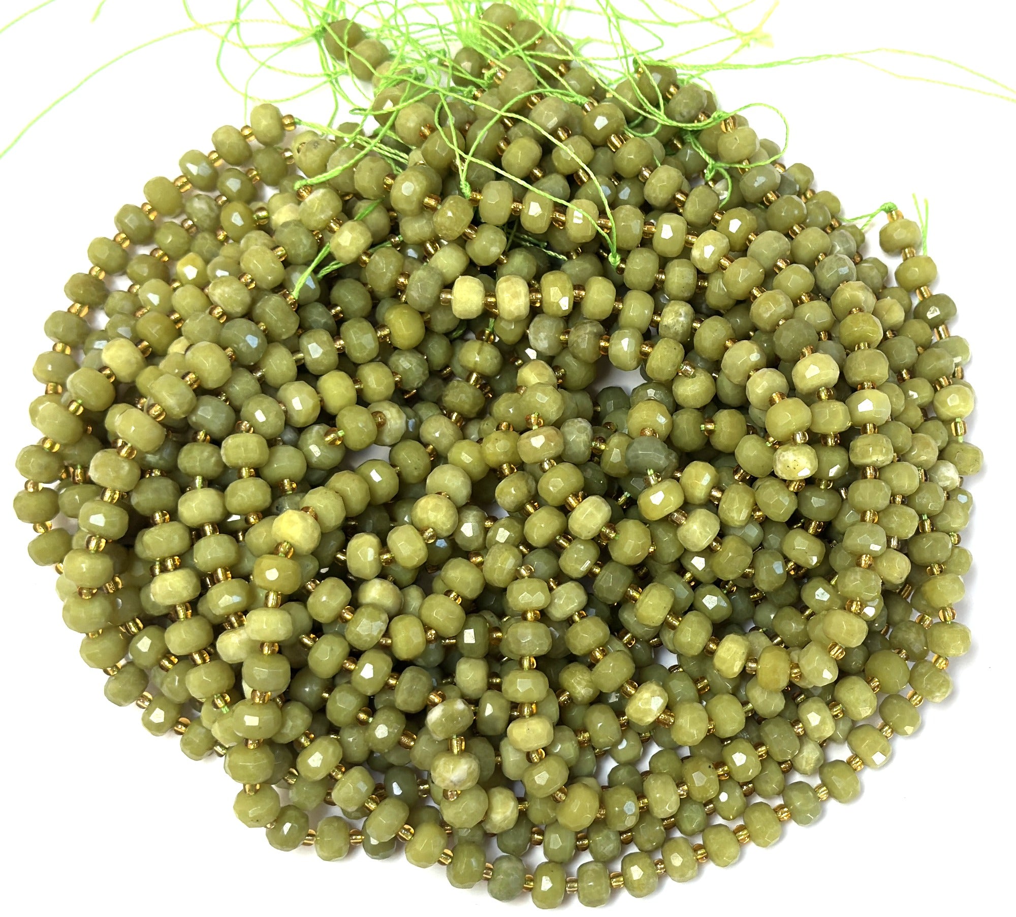 Serpentine 6x8mm micro faceted rondelle beads 38cm strand
