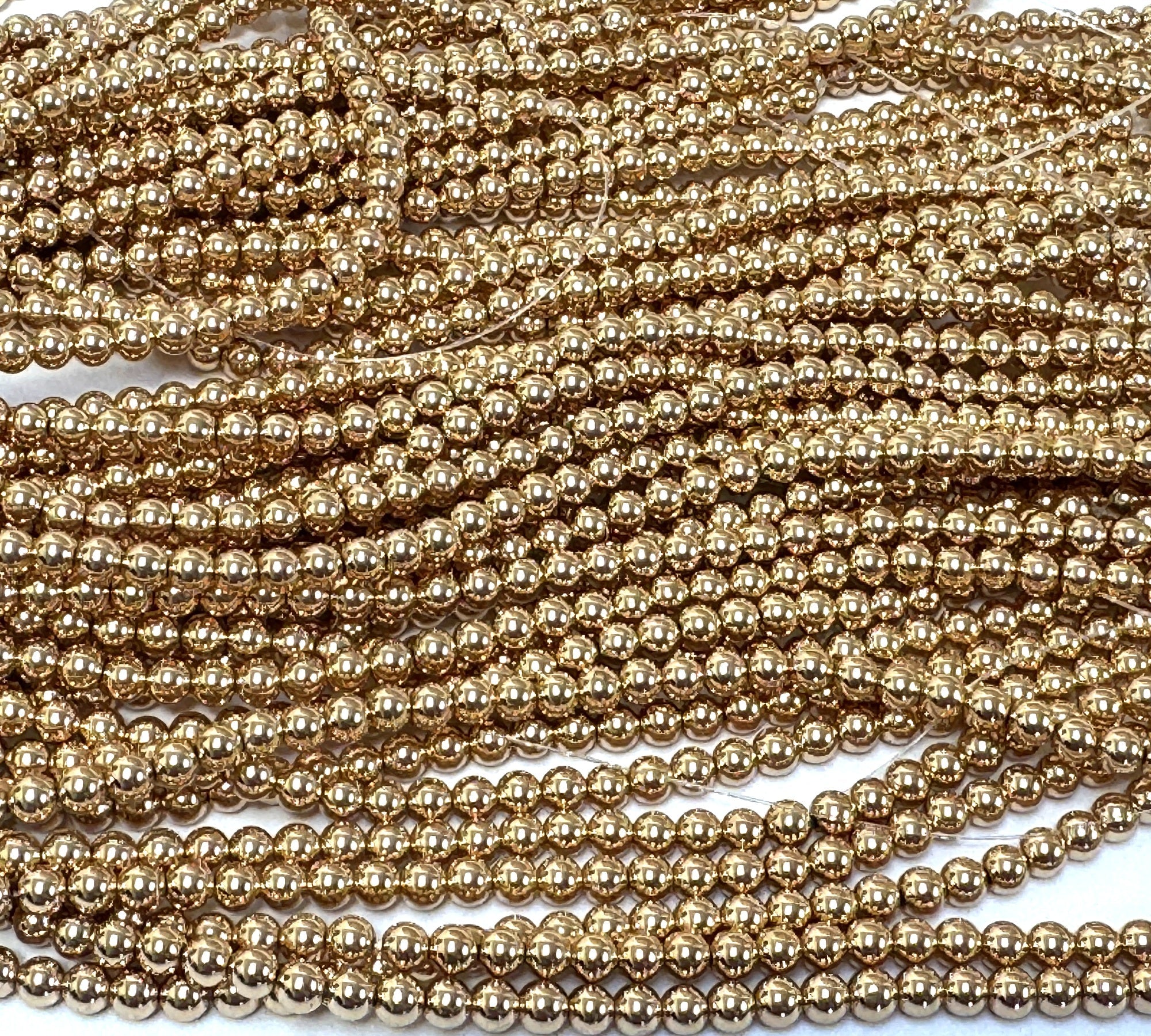 Gold Electroplated Hematite 4mm round spacer beads 40cm strand - Oz Beads 