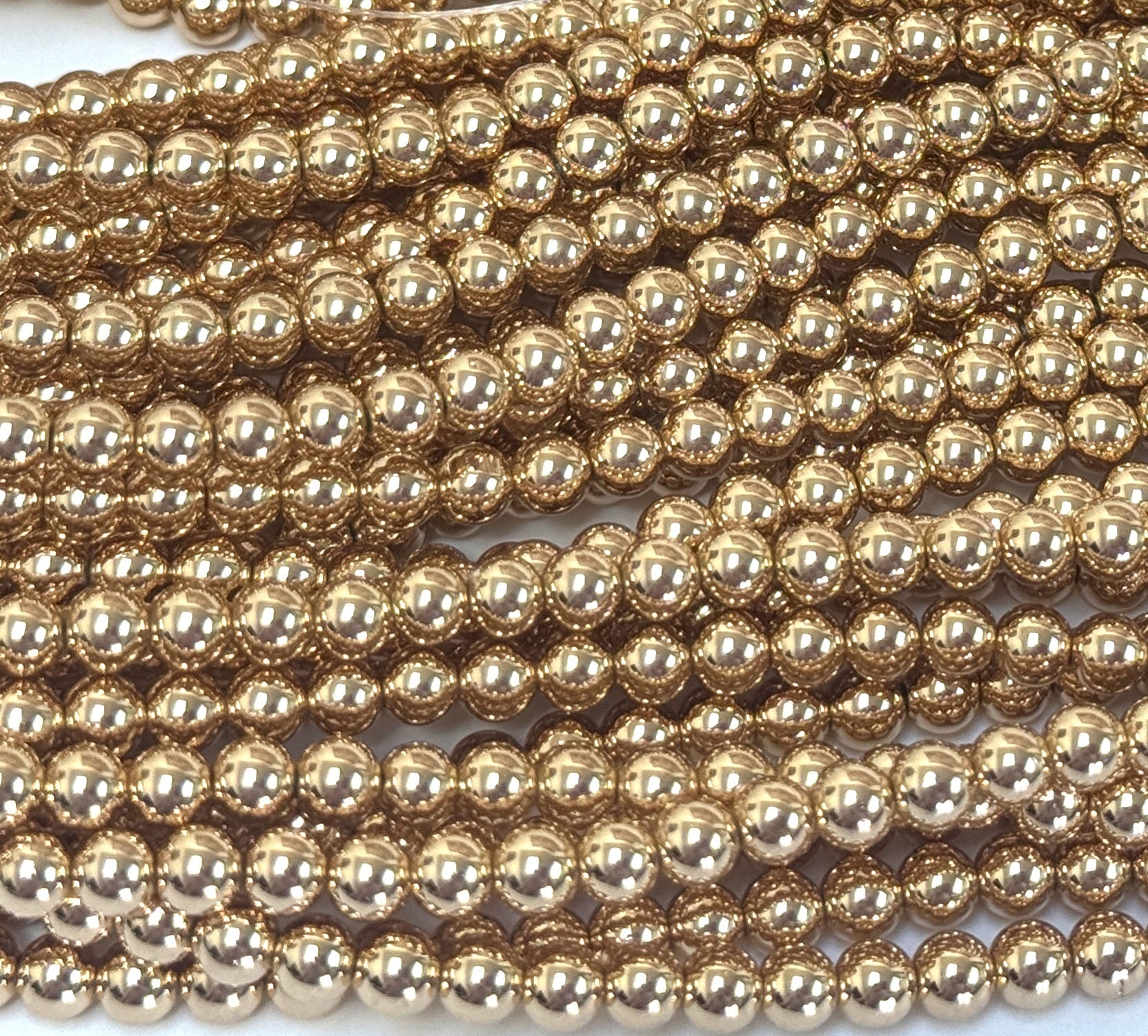 Gold Electroplated Hematite 4mm round spacer beads 40cm strand - Oz Beads 