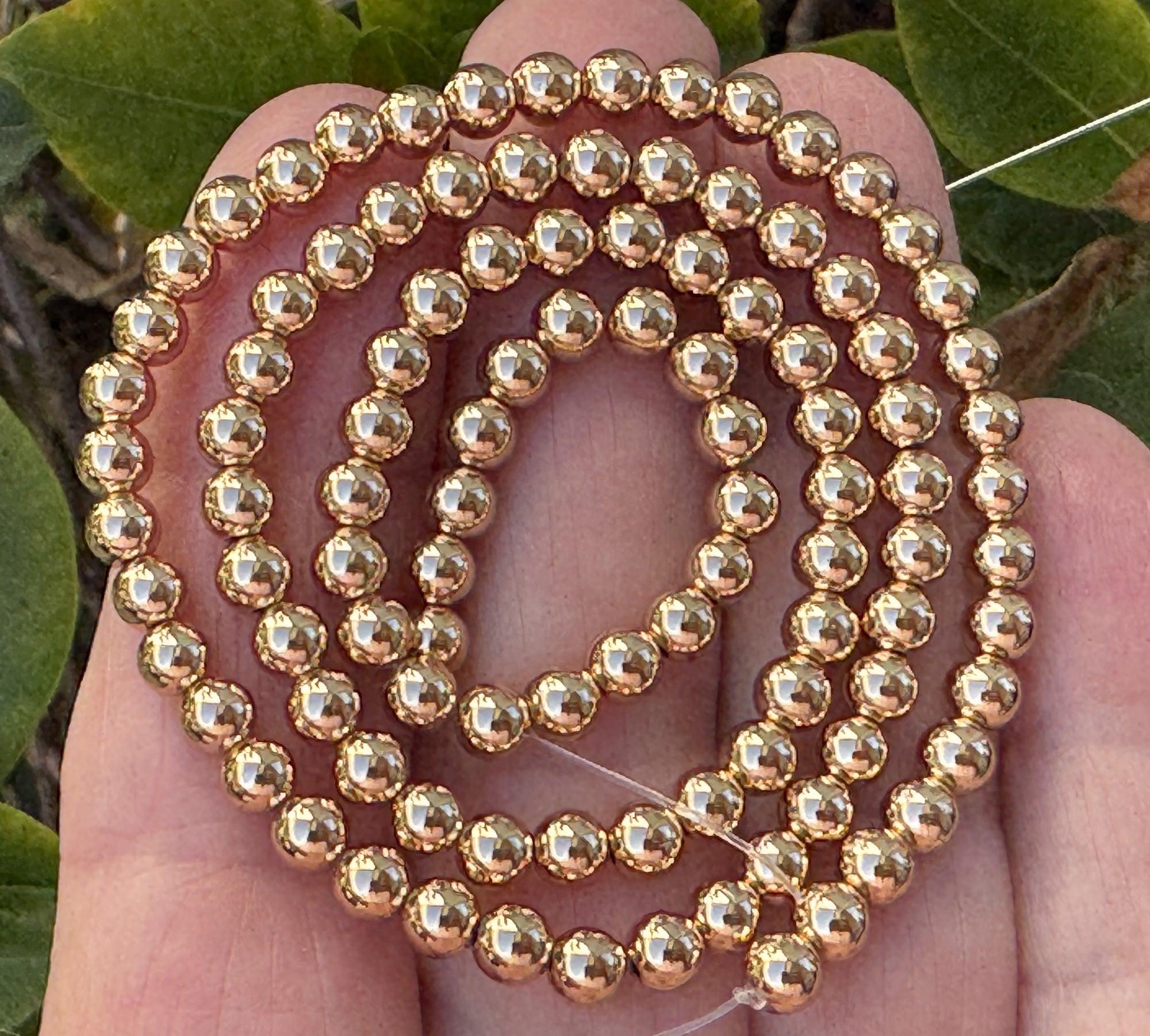Gold Electroplated Hematite 4mm round spacer beads 40cm strand - Oz Beads 