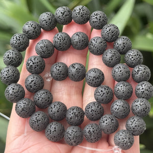 Black lava diffuser beads, round natural volcanic lava in 6, 8, 10 mm sizes on a 15.5-inch strand.