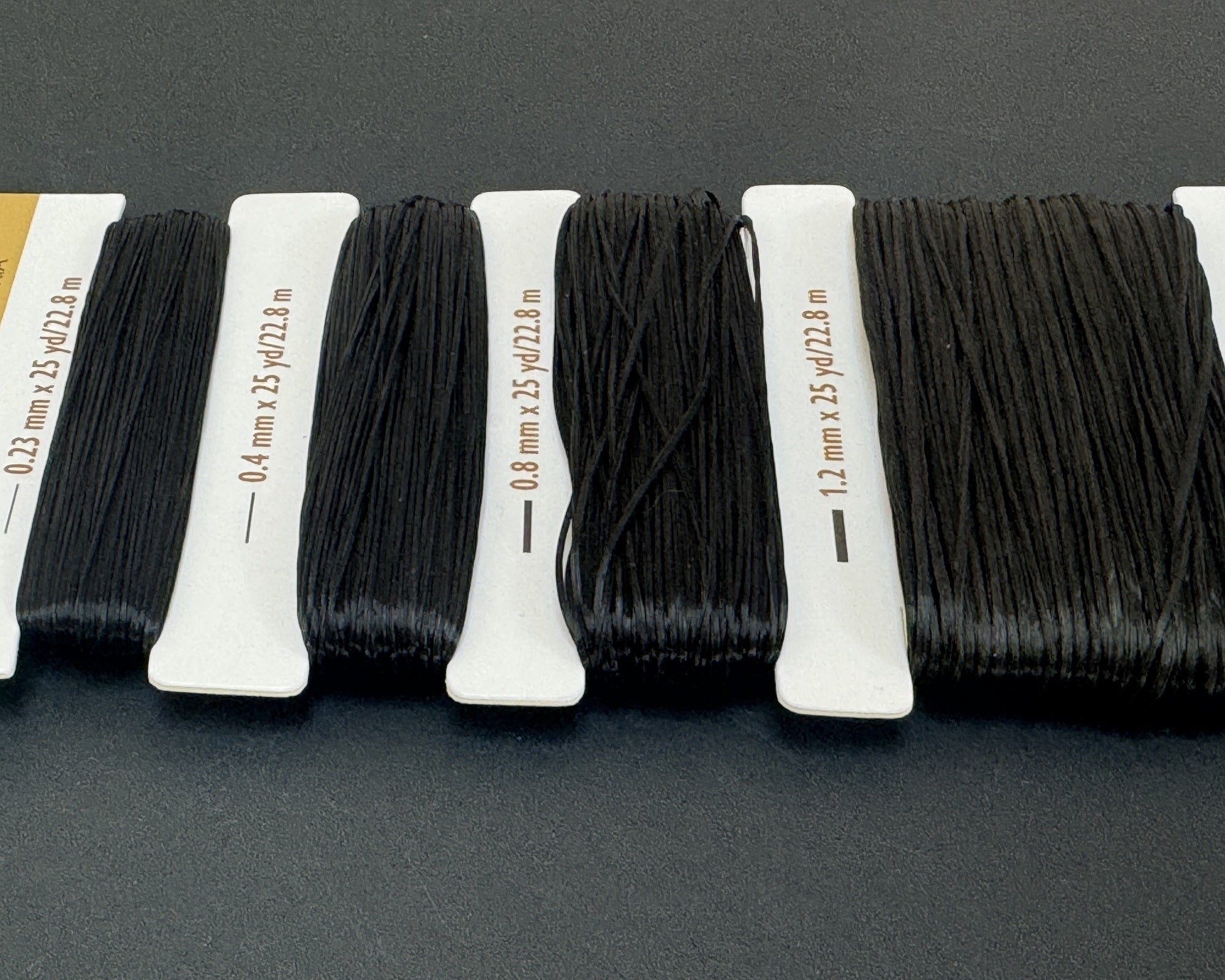 Opelon Black Stretch Fiber Cord Variety Pack 4 sizes 22.8 meters each - Oz Beads 
