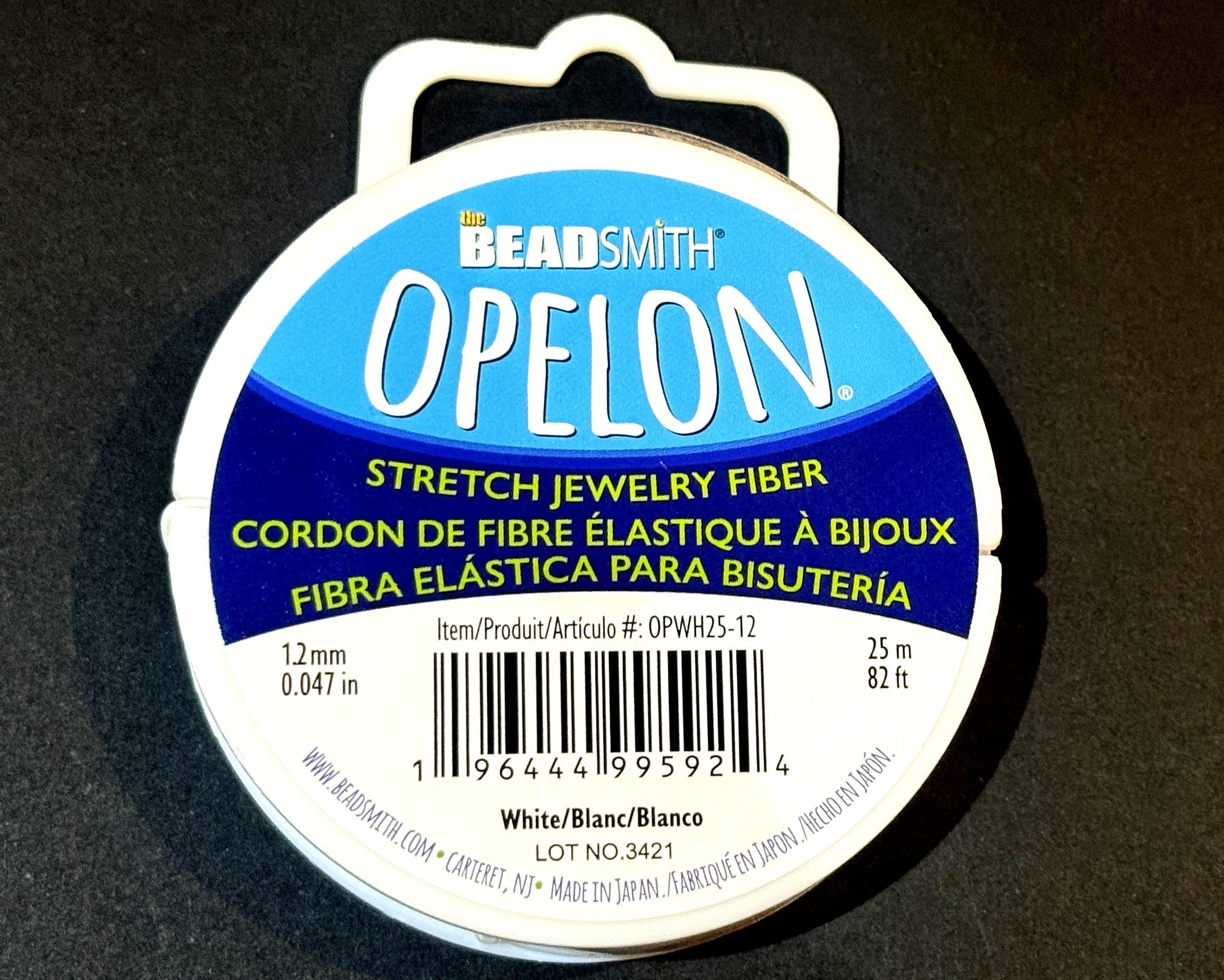 Opelon 1.2mm stretch jewelry fiber elastic cord, 25 meter spool NEW - Oz Beads 