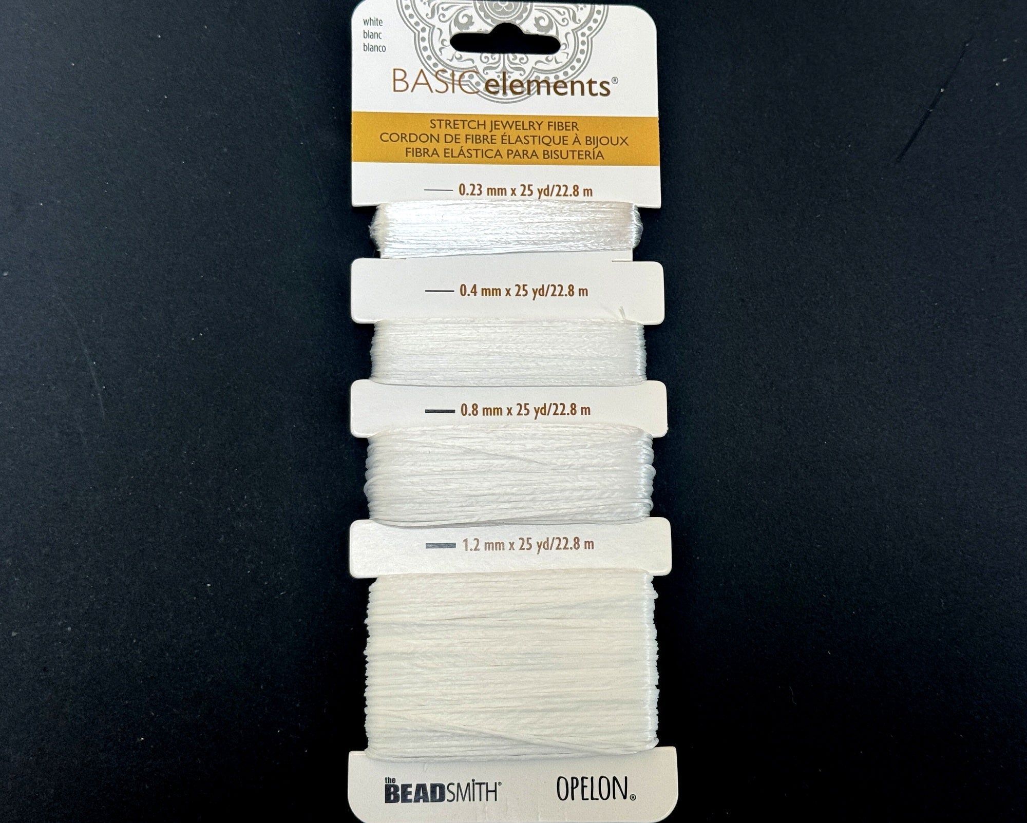 Opelon White Stretch Fiber Cord Variety Pack 4 sizes 22.8 meters each - Oz Beads 