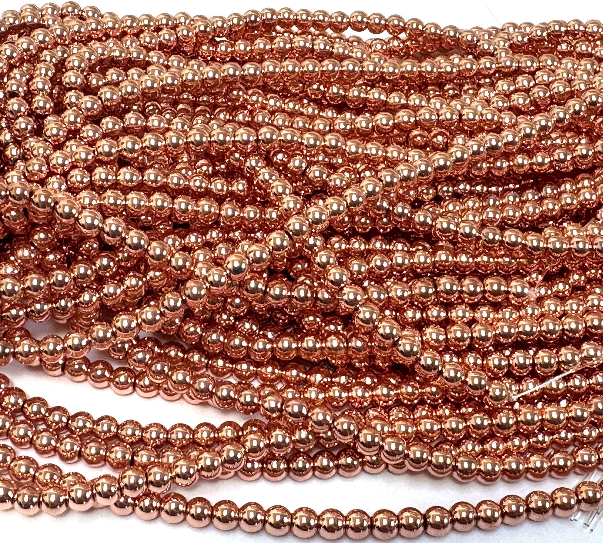 Rose Gold Electroplated Hematite 4mm round spacer beads 39cm strand - Oz Beads 