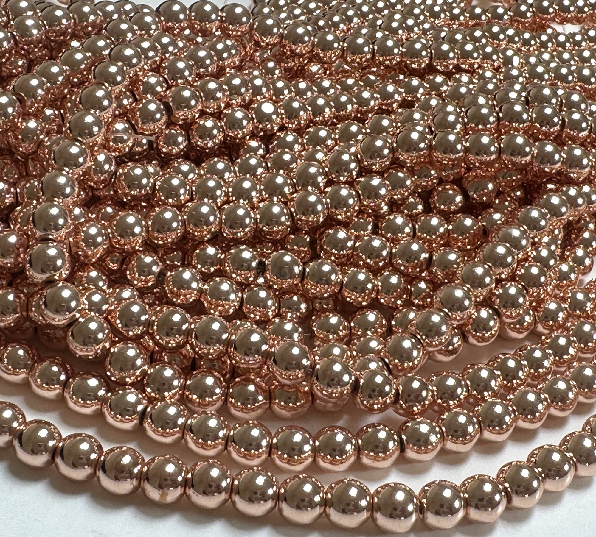 Rose Gold Electroplated Hematite 6mm round spacer beads 15.5" strand - Oz Beads 