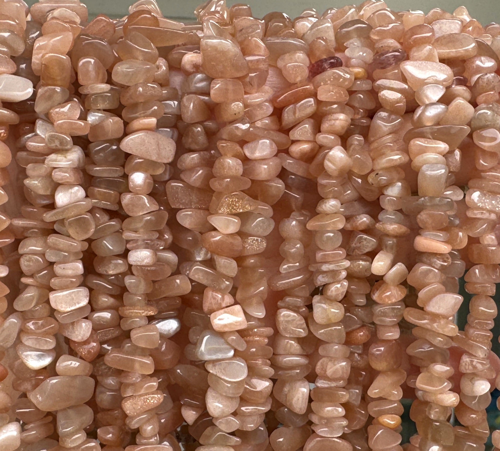 Orange Sunstone 7-10mm chip beads natural gemstone chips 32" strand - Oz Beads 