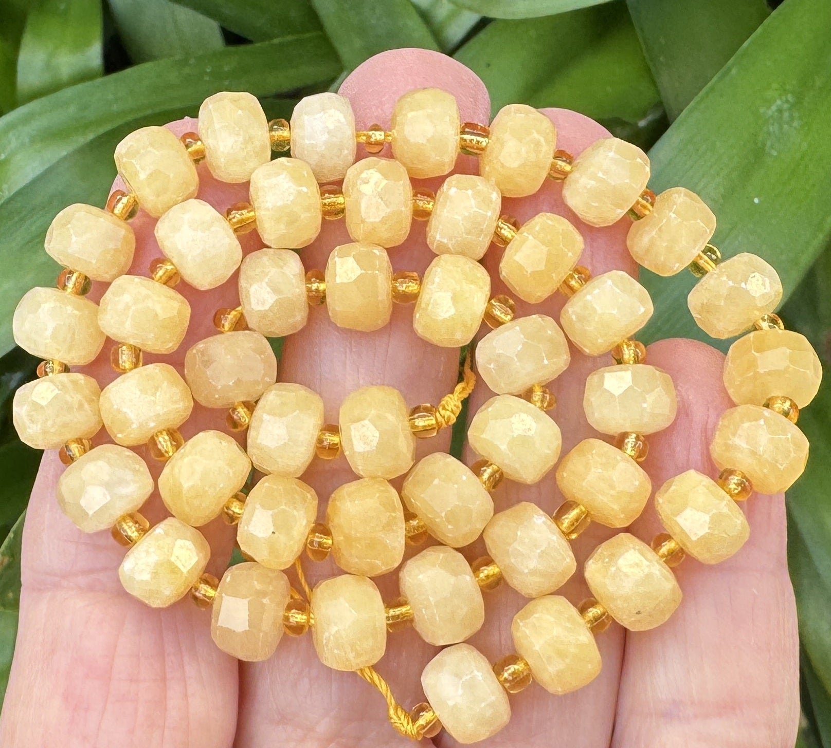 Yellow Calcite 6x8mm faceted rondelle gemstone beads 38cm strand - Oz Beads