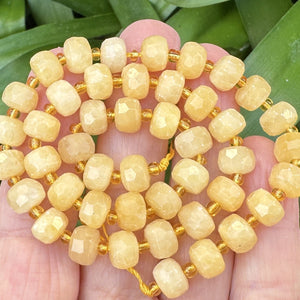 Yellow Calcite 6x8mm faceted rondelle gemstone beads 38cm strand - Oz Beads