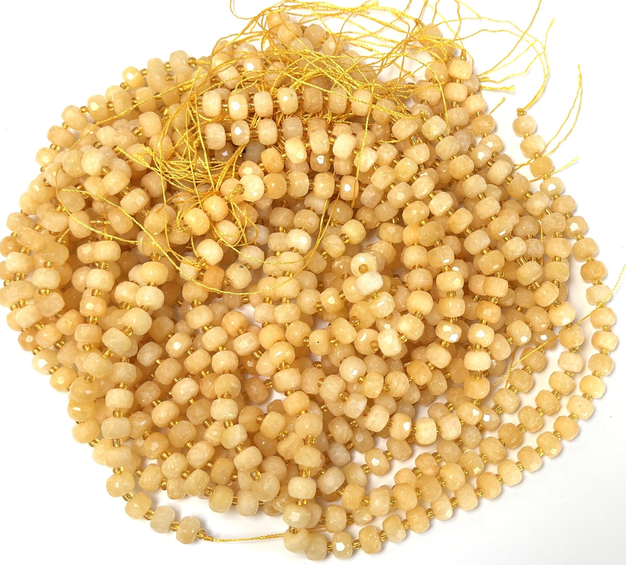 Yellow Calcite 6x8mm micro faceted rondelle beads 38cm strand - Oz Beads