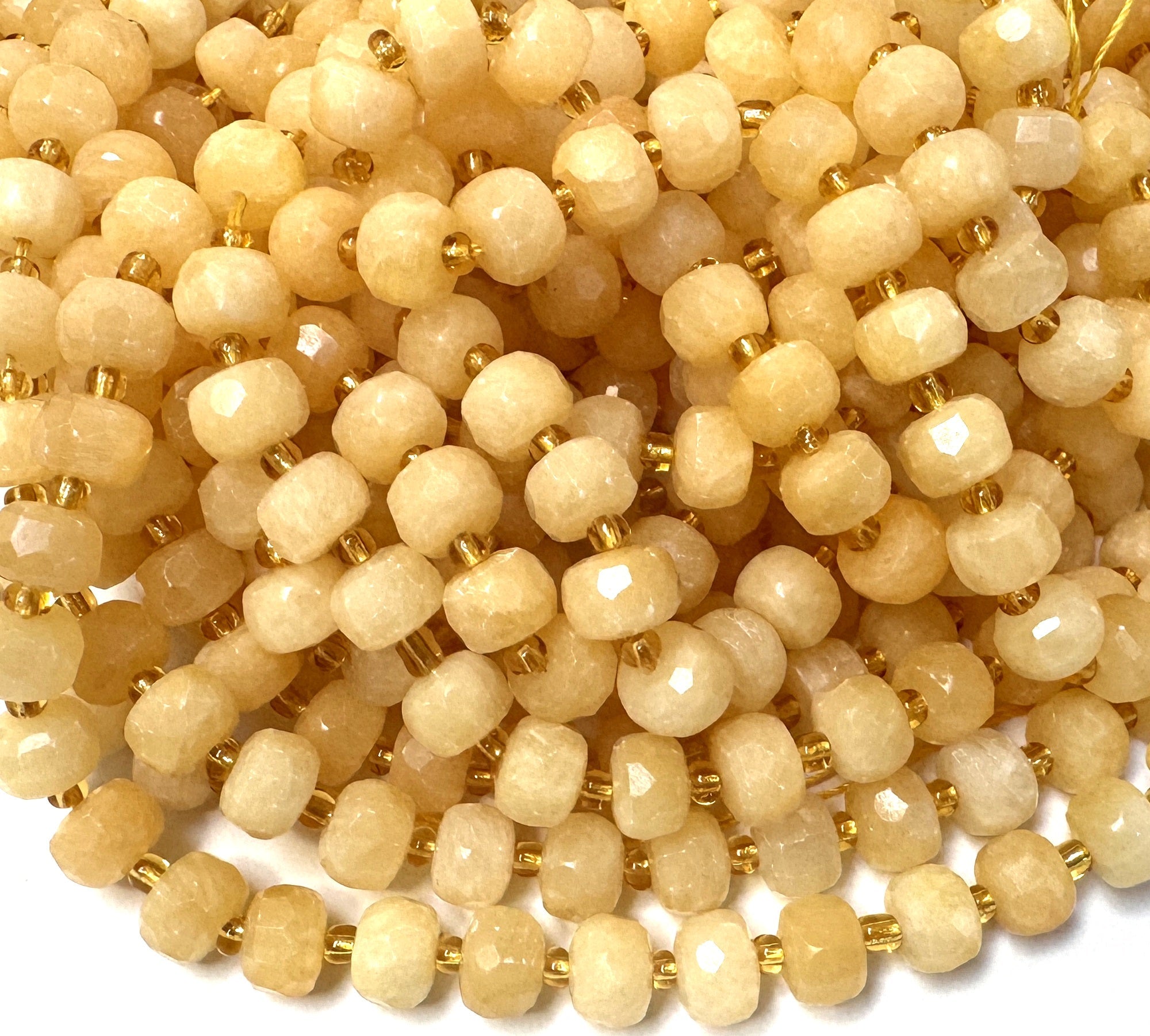 Yellow Calcite 6x8mm micro faceted rondelle beads 38cm strand - Oz Beads