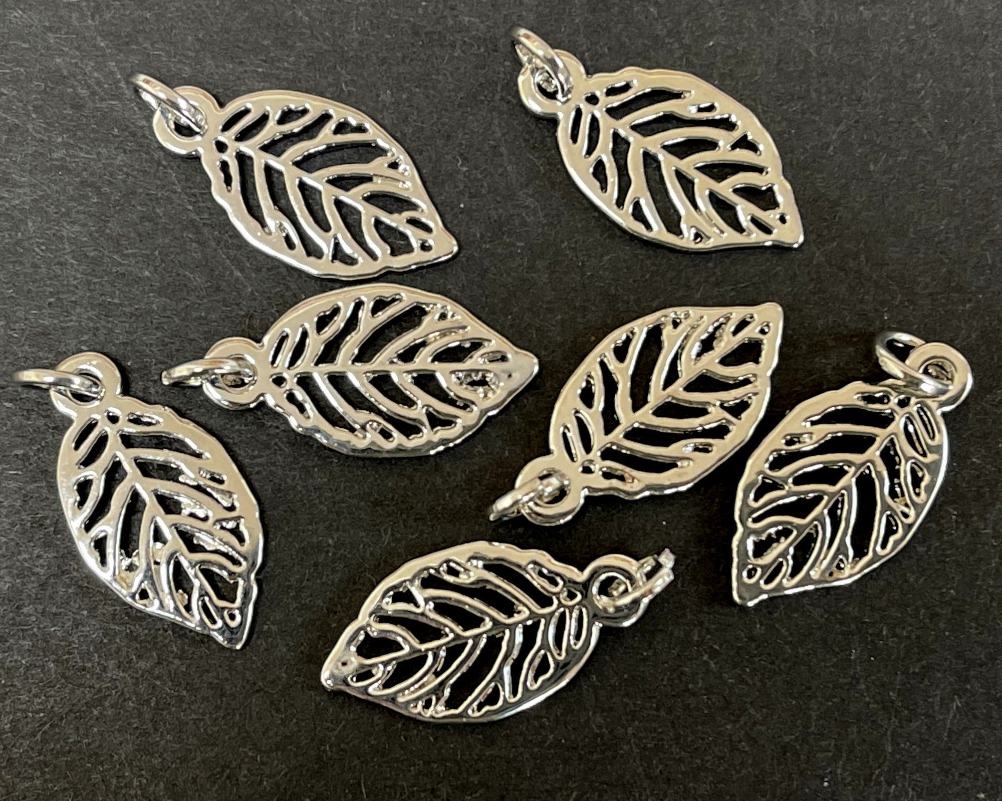Leaf charm 10x19mm platinum silver plated metal alloy pendant charm - Oz Beads 