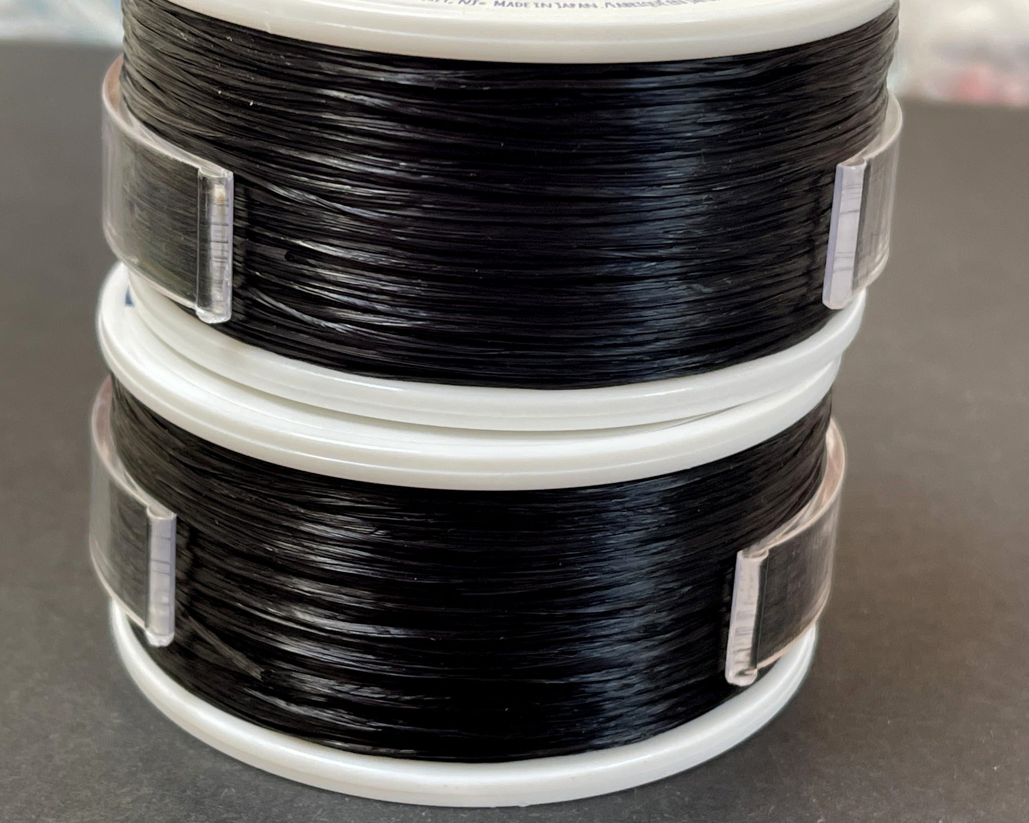 Opelon Black 0.7mm Stretch Elastic Cord, 100 meter spool - Oz Beads 